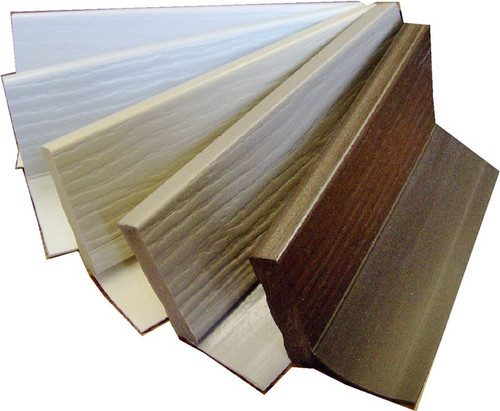 Cellular PVC doorstop molding with vinyl flap installed on a garage door jamb at a Hampton Roads home