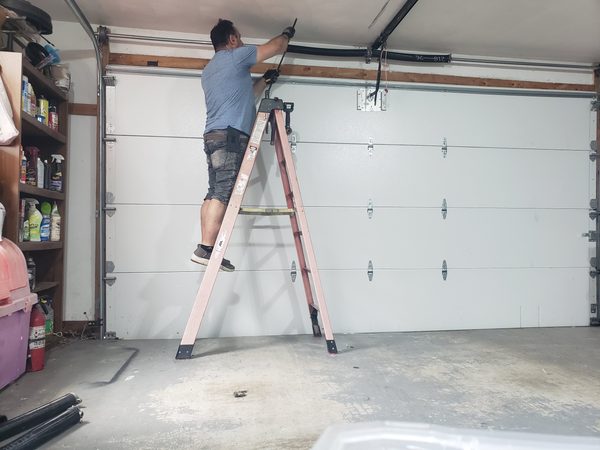New garage door installed with torsion spring system