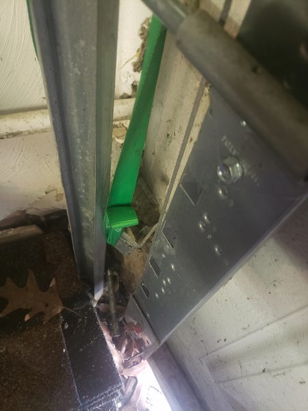 Garage door off its track — emergency repair